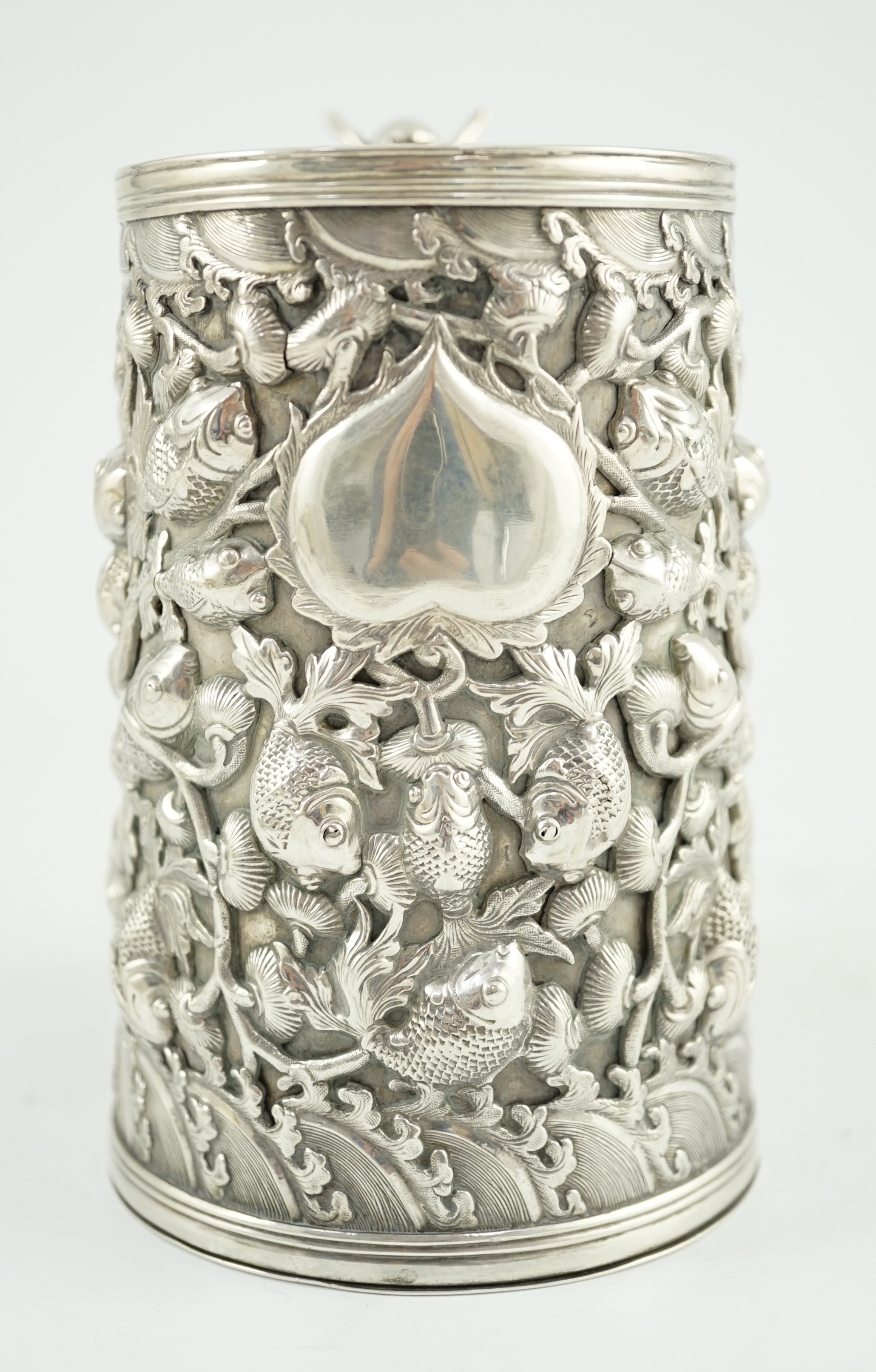 A late 19th century Chinese Export double skinned silver mug, by Cumwo
